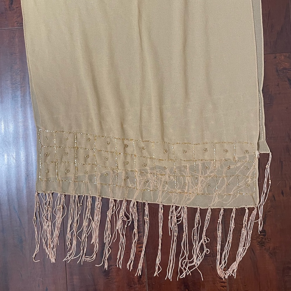 Extra Long Beaded Mesh Scarf in beige/cream color. It’s so lightweight